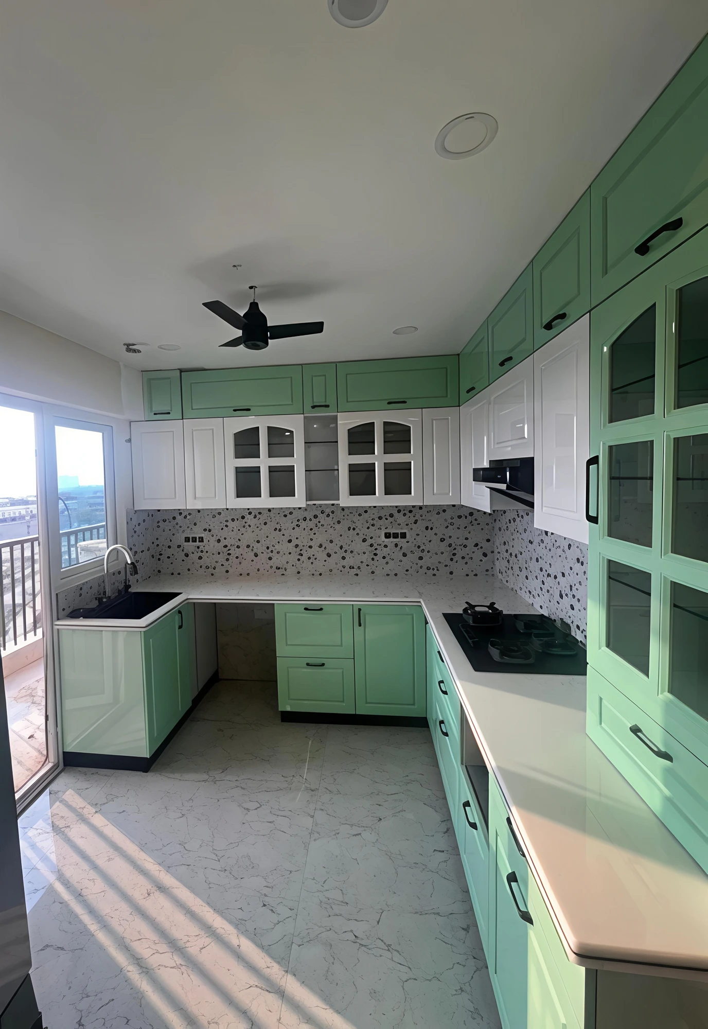 Mint and white L-shaped modular kitchen, second angle