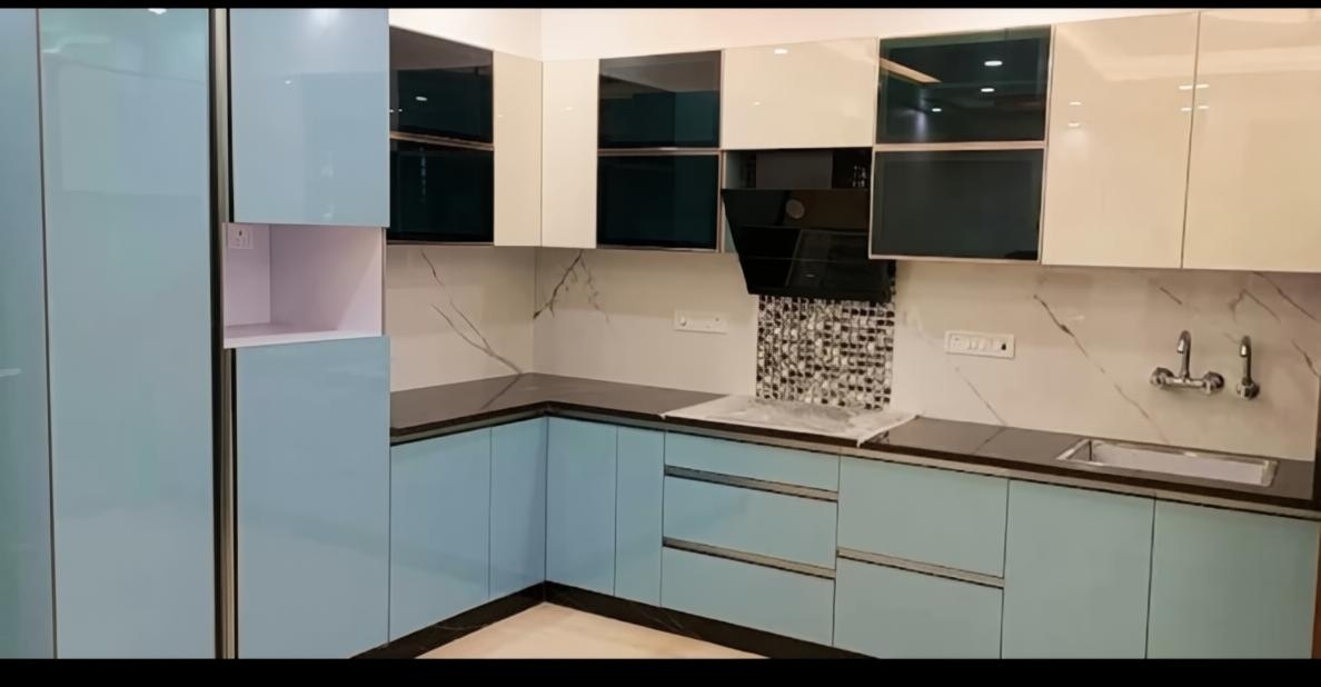Pastel blue L-shaped modular kitchen